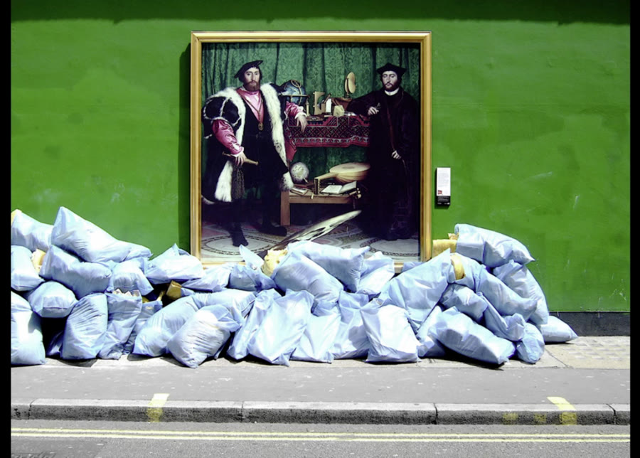 A framed reproduction of Holbein's The Ambassadors hung on a green wall above a pile of pale blue bin bags on a London street